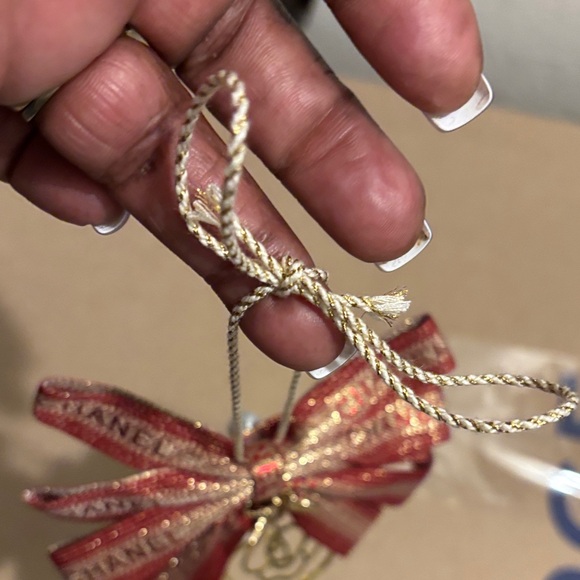 Chanel Red and Gold Ribbon with White Floral Accent - Picture 11 of 16
